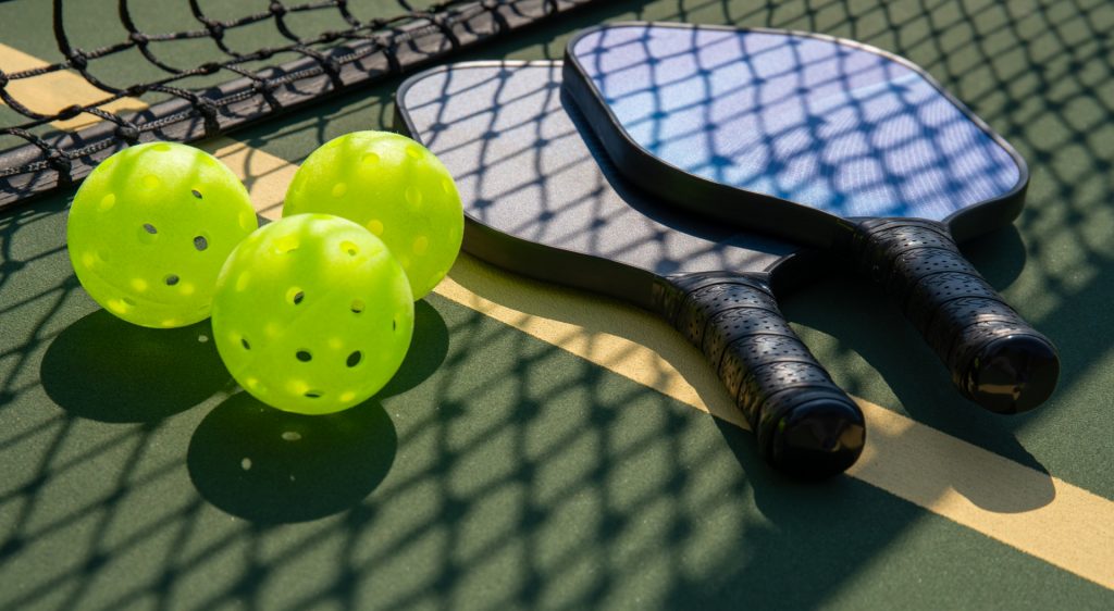 Picklelball paddles and balls