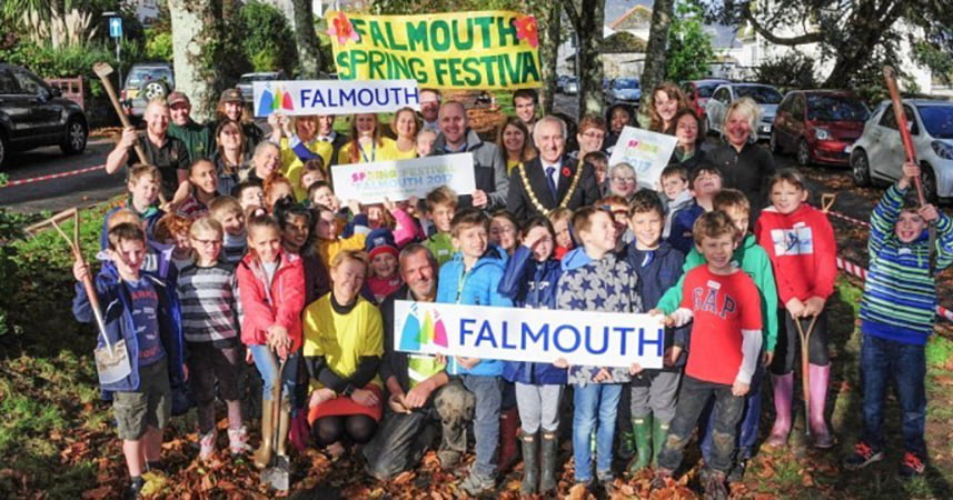 Group of people celebrating Falmouth Spring Festival in Cornwall.