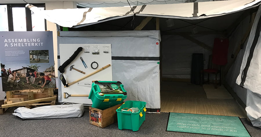Photo of a display of how shelterbox works, and the tools needed.