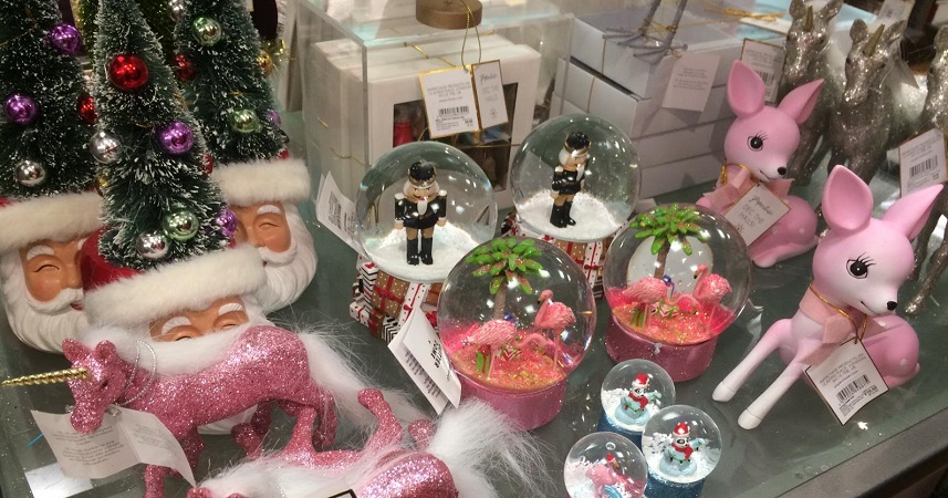 Christmas themed santa heads, snow globes and deer household ornaments.