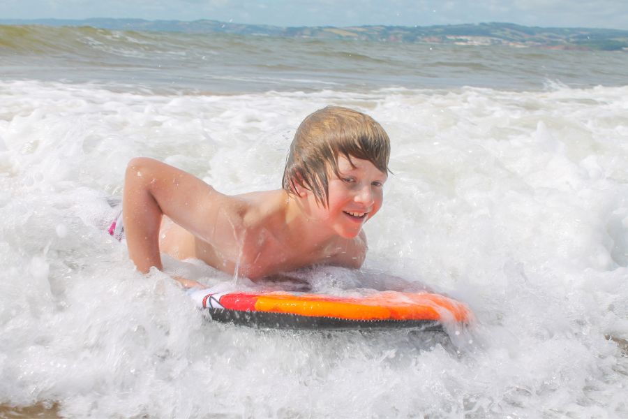 Boy on bodyboard in the surf