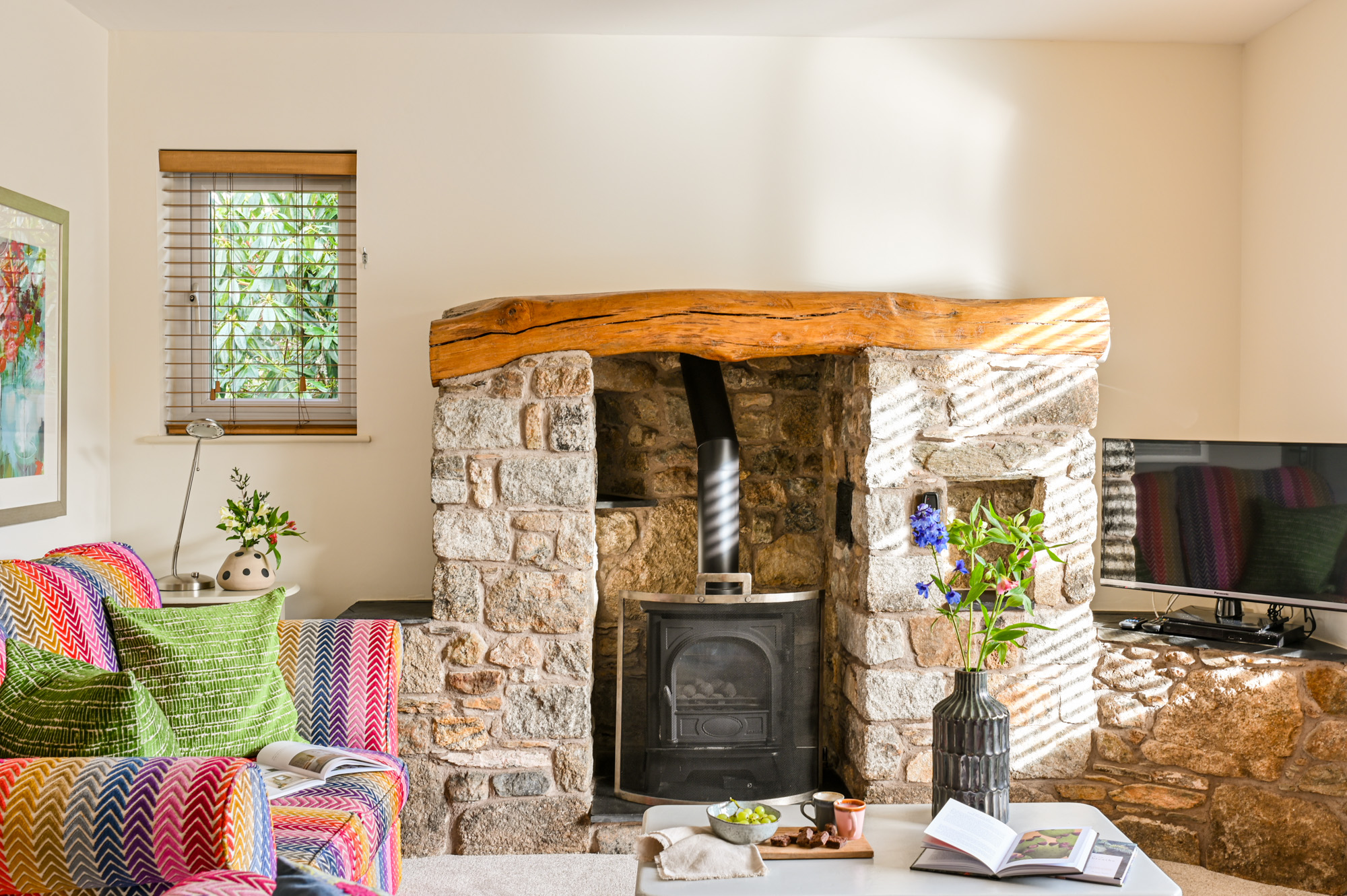 stone fireplace and wood burning stove