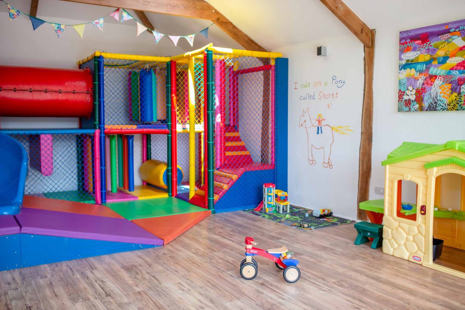 A rainbow indoor playbarn for young children located at Bosinver in Cornwall