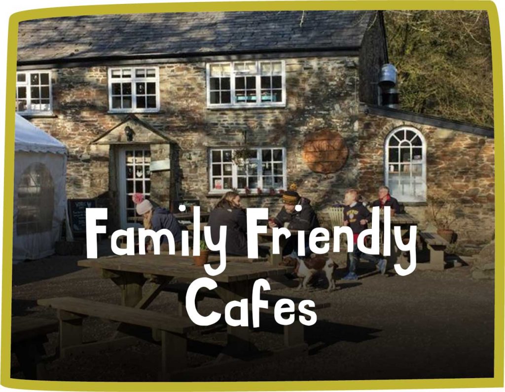 green framed image of the outside of a stone work cafe, families sit in the sun. White text reads 'family friendly cafes'