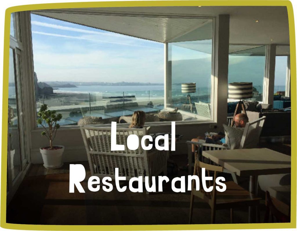 green framed image of a couple in a restaurant with a beautiful sea view. White text reads 'local restaurants'