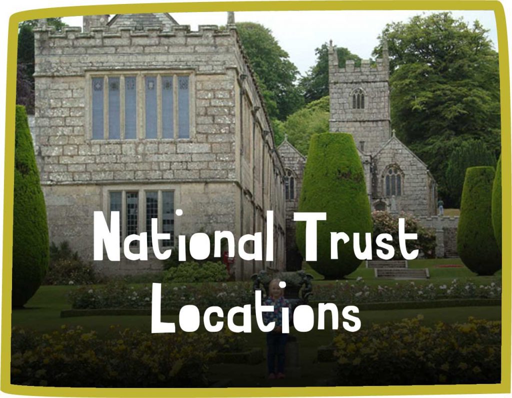 Green framed photo of a stone building and chapel with white text reading 'National Trust Locations'