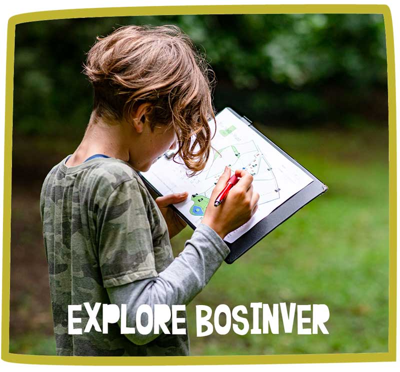 Child exploring and editing a map of Bosinver whilst exploring the site.