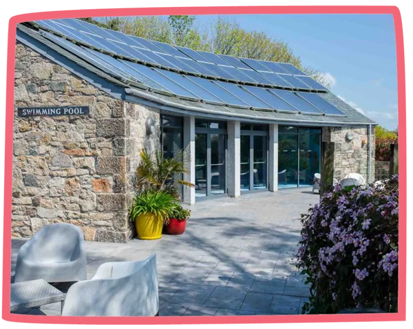 Photo of the exterior of the swimming pool building at Bosinver.