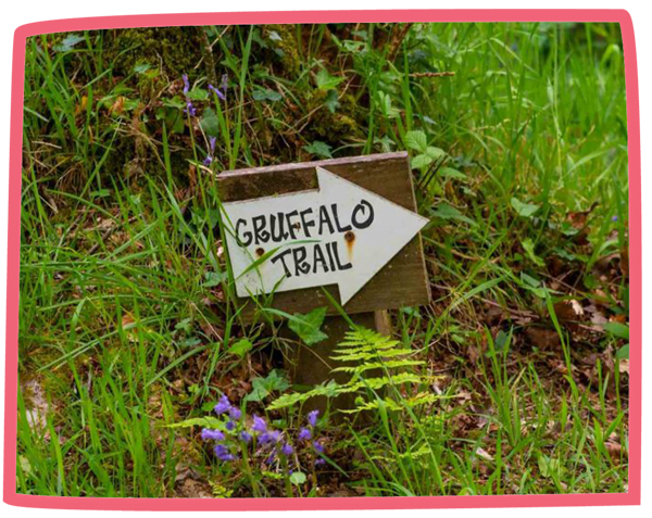 Sign for the Gruffalo Trail amongst the grass at Bosinver.