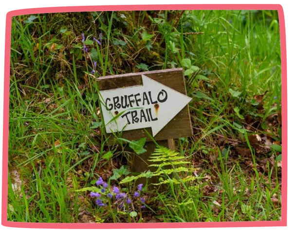 Sign for the Gruffalo Trail amongst the grass at Bosinver.